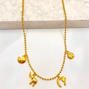 Gold Charm Necklace
Stainless steel